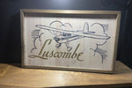 Luscombe Sign